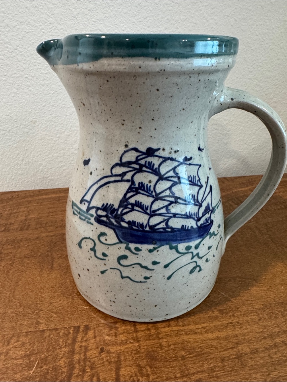 Speckled Ceramic Pitcher with Blue Ship Motif
